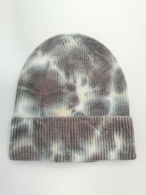 Czapka beanie z dzianiny w wzór tie-dye w odcieniach szarości, kremu i brązu, z podwiniętym mankietem.